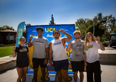 5 athlete's showing the school hand sign, excited to be back at school.