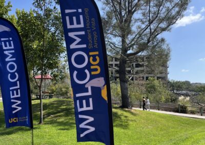 A welcome banner waves in the wind.